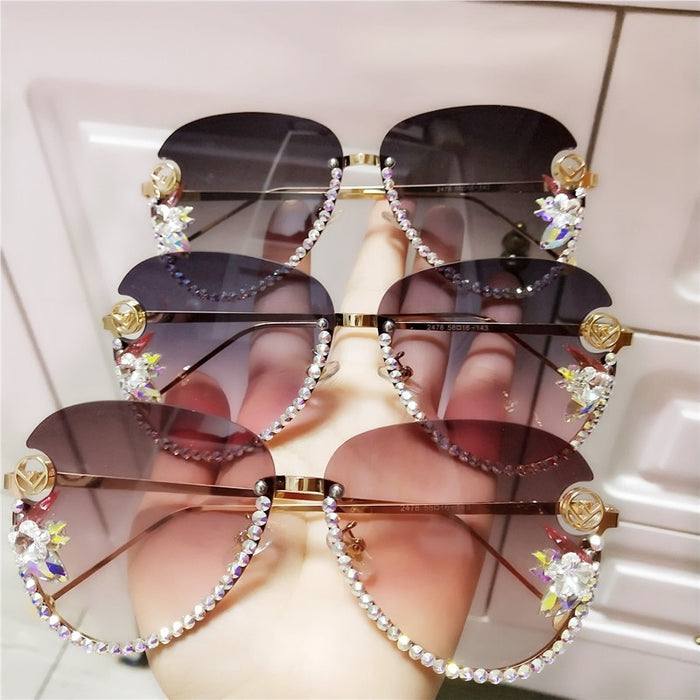 Women's Rimless Oval 'Luxury Shadows' Metal Sunglasses