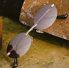 Women's Rimless Oval 'Visenza' Metal Sunglasses