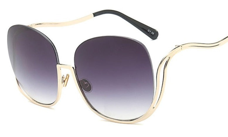 Women's Oversized Round Rimless 'Cathal ' Metal Sunglasses