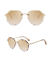 Women's Rimless Round 'Diamond Cut' Metal Sunglasses